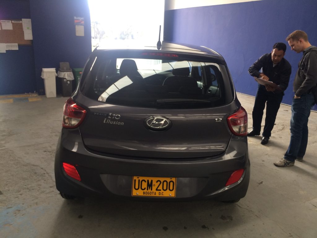 The very long process of renting a car in Bogota. Taken right after they took my fingerprints!
